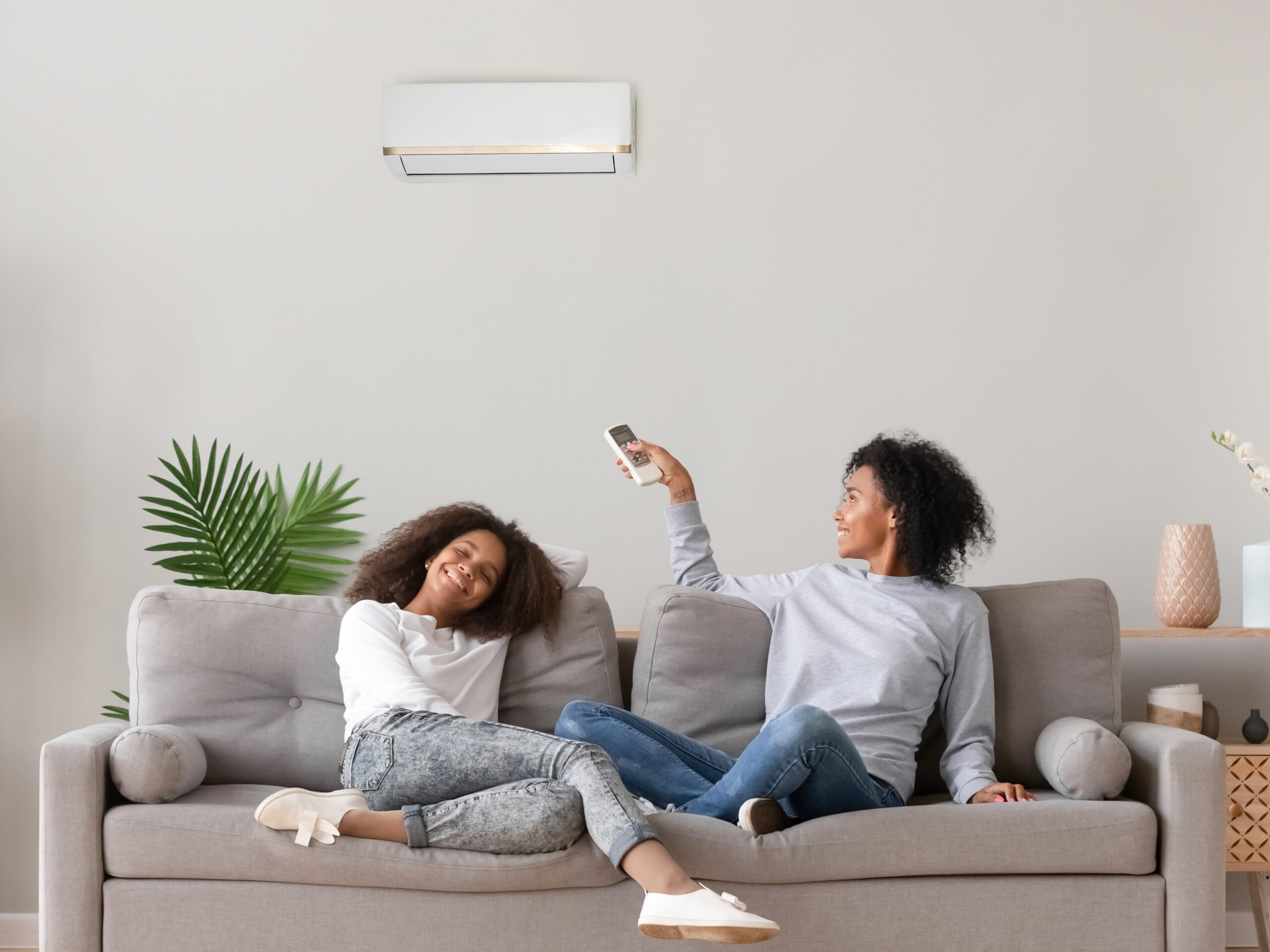 Photo of mother and daughter in Missoula, Montana with HVAC system